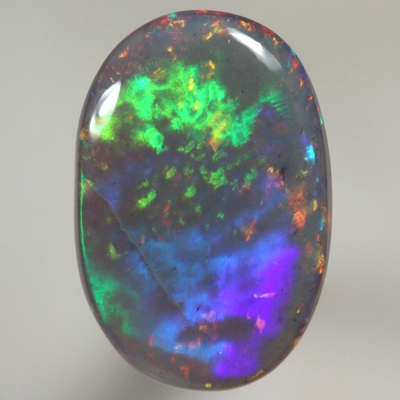 SOLID SEMI BLACK OPAL Large rolling flash of green and blue over sparkling red and orange See video